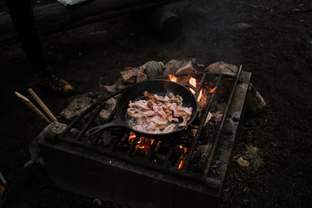 black metal fire pit with fire